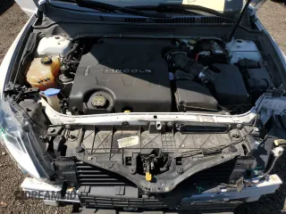 2015 Lincoln MKZ z VIN 3LN6L2JK8FR616661, wystawiony jako Copart lot #61588325 z przebiegiem 65 382 mil mil oraz Szkoda całkowita • Salvage title. Historia ofert i sprzedaży dostępna na DreamBid. Obrazek 11.