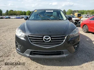 2016 Mazda CX-5 Grand Touring with VIN JM3KE2DY4G0761993, listed as a Copart auction lot 53204265 with 184,249 mi miles and Clean Title. Bid and sale history available at carsss.com. Image 5.