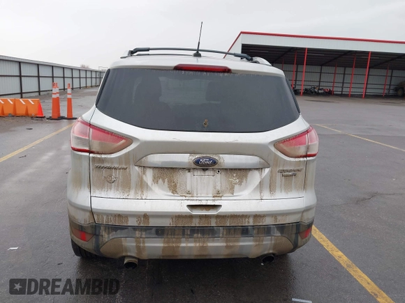2015 Ford Escape Titanium with VIN 1FMCU9J97FUA84589, listed as a IAAI auction lot 41688156 with 129,073 mi miles. Bid and sale history available at carsss.com. Image 17.