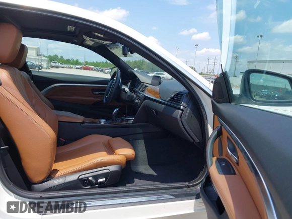 2016 BMW 4 Series 428i with VIN WBA3N7C51GK228910, listed as a IAAI auction lot 42341589 with 85,127 mi miles and . Bid and sale history available at DreamBid. Image 5.