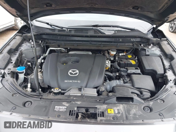 2020 Mazda CX-5 Touring with VIN JM3KFBCM2L0850855, listed as a IAAI auction lot 42147339 with 75,955 mi miles and . Bid and sale history available at carsss.com. Image 10.