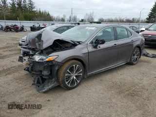 2020 Toyota Camry Hybrid LE z VIN 4T1B21HK0LU522683, wystawiony jako Copart lot #55538185 z przebiegiem 75 316 mil mil oraz Szkoda całkowita • Salvage title. Historia ofert i sprzedaży dostępna na DreamBid. Obrazek 1.