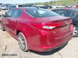 2013 Kia Optima SX w/Limited Pkg with VIN 5XXGR4A66DG137530, listed as a IAAI auction lot 41940486 with 124,605 mi miles. Bid and sale history available at carsss.com. Image 3.