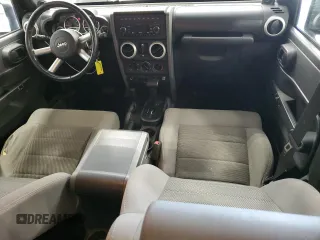 2008 Jeep Wrangler Unlimited Sahara with VIN 1J4GA59108L637009, listed as a Copart auction lot 63333705 with 181,778 mi miles and Clean title. Bid and sale history available at DreamBid. Image 8.