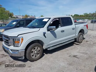 2023 Ford F-150 XL with VIN 1FTFW1E80PFB58830, listed as a IAAI auction lot 41823584 with 35,536 mi miles. Bid and sale history available at carsss.com. Image 2.