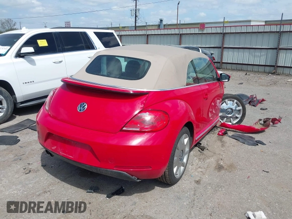 2015 Volkswagen Beetle 1.8T w/Tech with VIN 3VW517AT4FM803238, listed as a IAAI auction lot 41812373 with 42,369 mi miles and . Bid and sale history available at DreamBid. Image 4.