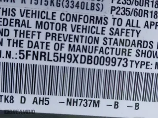 2013 Honda Odyssey Touring with VIN 5FNRL5H9XDB009973, listed as a IAAI auction lot 41904710 with 219,067 mi miles. Bid and sale history available at carsss.com. Image 9.