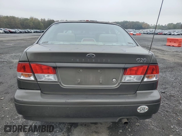 2000 Infiniti G20 Luxury z VIN JNKCP11A1YT304887, wystawiony jako Copart lot #74562724 z przebiegiem 202 140 mil mil oraz Czysty tytuł • Clean title. Historia ofert i sprzedaży dostępna na DreamBid. Obrazek 6.
