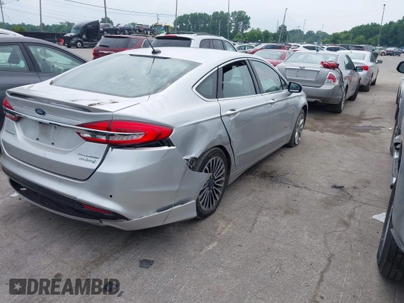 2017 Ford Fusion Hybrid Titanium с VIN 3FA6P0RU5HR181755, выставлен на аукционе IAAI как лот 42704832 с пробегом 152 688 миль миль и . История ставок и продаж доступна на DreamBid. Изображение 4.