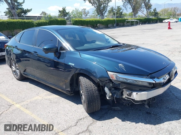 2018 Honda Clarity Plug-In Hybrid Touring with VIN JHMZC5F39JC022655, listed as a IAAI auction lot 42149002 with 118,913 mi miles. Bid and sale history available at carsss.com. Image 1.