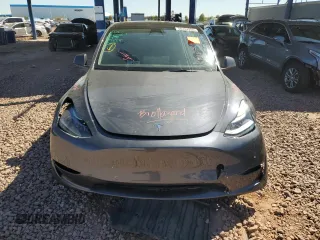 2022 Tesla Model Y Long Range z VIN 7SAYGDEE3NF543705, wystawiony jako Copart lot #50244955 z przebiegiem 59 063 mil mil oraz Szkody całkowita. Historia ofert i sprzedaży dostępna na DreamBid. Obrazek 5.