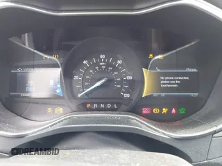 2014 Ford Fusion SE Hybrid with VIN 3FA6P0LU7ER154559, listed as a IAAI auction lot 42198548 with 244,630 mi miles. Bid and sale history available at carsss.com. Image 7.