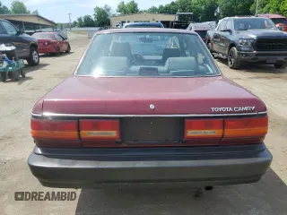 1991 Toyota Camry z VIN 4T1SV24E2MU387012, wystawiony jako Copart lot #57576164 z przebiegiem 117 436 mil mil oraz Nie do naprawy • Non repairable. Historia ofert i sprzedaży dostępna na DreamBid. Obrazek 6.