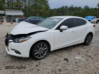 2018 Mazda 3 Touring z VIN 3MZBN1V32JM238303, wystawiony jako Copart lot #60706125 z przebiegiem 70 260 mil mil oraz Szkoda całkowita • Salvage title. Historia ofert i sprzedaży dostępna na DreamBid. Obrazek 1.