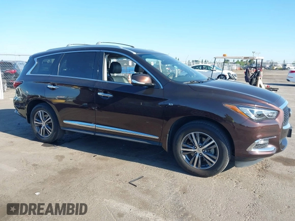 2019 Infiniti QX60 Pure with VIN 5N1DL0MM4KC569307, listed as a IAAI auction lot 42300605 with 40,336 mi miles and . Bid and sale history available at DreamBid. Image 14.
