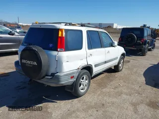 2000 Honda CR-V EX with VIN JHLRD1869YS000284, listed as a IAAI auction lot 41735106 with 160,956 mi miles. Bid and sale history available at carsss.com. Image 4.