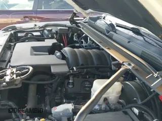 2018 Chevrolet Tahoe Commercial z VIN 1GNSKFECXJR201692, wystawiony jako IAAI lot #41606352 z przebiegiem 36 882 mil mil oraz . Historia ofert i sprzedaży dostępna na DreamBid. Obrazek 21.