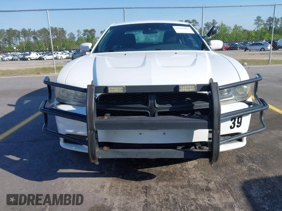 2014 Dodge Charger Police with VIN 2C3CDXAT8EH348719, listed as a IAAI auction lot 42026437 with 140,573 mi miles and . Bid and sale history available at DreamBid. Image 12.
