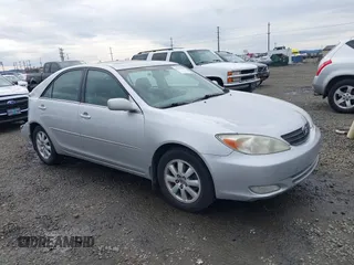 2004 Toyota Camry LE with VIN 4T1BF32K44U585697, listed as a IAAI auction lot 41625006 with 223,434 mi miles. Bid and sale history available at carsss.com. Image 1.