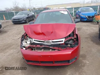2009 Ford Focus SE z VIN 1FAHP35N69W197700, wystawiony jako IAAI lot #41834668 z przebiegiem 176 623 mil mil oraz . Historia ofert i sprzedaży dostępna na DreamBid. Obrazek 13.