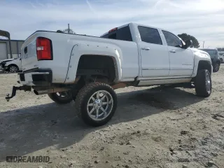 2017 GMC Sierra 2500HD Denali with VIN 1GT12UEGXHF169804, listed as a Copart auction lot 43223325 with 121,469 mi miles and Salvage Title. Bid and sale history available at carsss.com. Image 3.