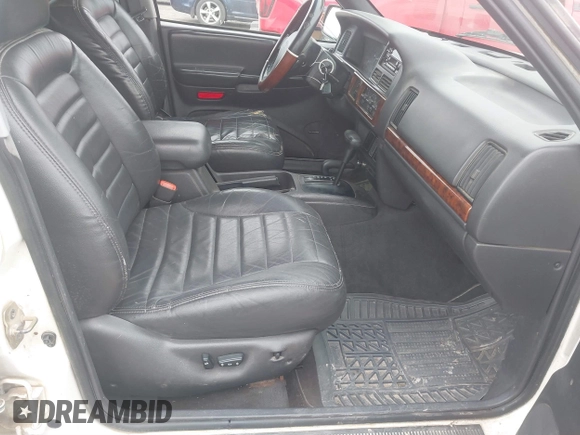 1998 Jeep Grand Cherokee Laredo with VIN 1J4GZ48S3WC204990, listed as a IAAI auction lot 41704176 with 185,376 mi miles. Bid and sale history available at carsss.com. Image 5.