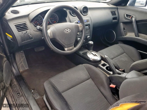 2008 Hyundai Tiburon GS with VIN KMHHM66D98U283776, listed as a Copart auction lot 51109895 with 125,095 mi miles and Salvage Title. Bid and sale history available at carsss.com. Image 8.