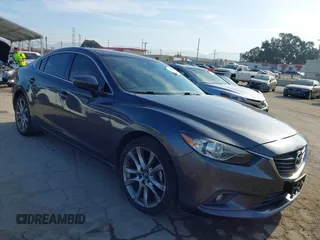 2015 Mazda 6 i Grand Touring with VIN JM1GJ1W55F1220578, listed as a IAAI auction lot 42076034 with 77,904 mi miles. Bid and sale history available at carsss.com. Image 1.