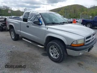 2003 Dodge Dakota Sport with VIN 1D7HG32N13S132871, listed as a IAAI auction lot 42059965 with 125,408 mi miles and . Bid and sale history available at carsss.com. Image 1.
