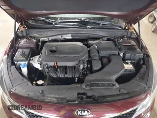 2016 Kia Optima LX with VIN 5XXGT4L3XGG073744, listed as a IAAI auction lot 41586212 with 111,628 mi miles. Bid and sale history available at carsss.com. Image 10.