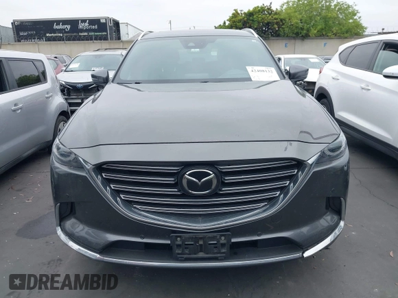 2018 Mazda CX-9 Grand Touring with VIN JM3TCBDY1J0200183, listed as a IAAI auction lot 42408132 with 69,023 mi miles and . Bid and sale history available at DreamBid. Image 13.