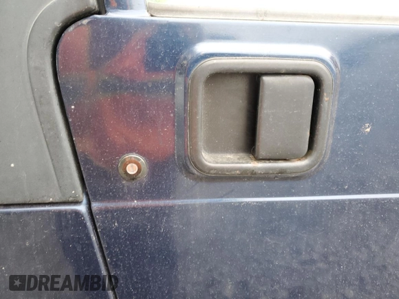 2001 Jeep Wrangler Sport with VIN 1J4FA49S01P363856, listed as a Copart auction lot 62494785 with 154,782 mi miles and Salvage title. Bid and sale history available at DreamBid. Image 11.