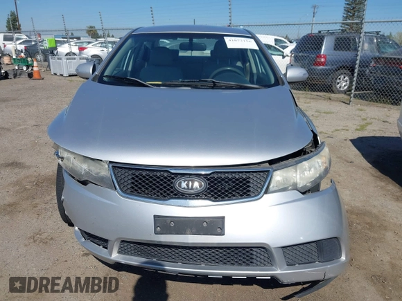 2010 Kia Forte EX with VIN KNAFU4A2XA5097831, listed as a IAAI auction lot 41872156 with 168,081 mi miles. Bid and sale history available at carsss.com. Image 12.