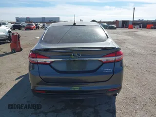 2017 Ford Fusion Hybrid Titanium z VIN 3FA6P0RU0HR314681, wystawiony jako IAAI lot #41288256 z przebiegiem 174 027 mil mil oraz . Historia ofert i sprzedaży dostępna na DreamBid. Obrazek 16.