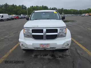 2011 Dodge Nitro SE z VIN 1D4PT2GK2BW589063, wystawiony jako IAAI lot #42408917 z przebiegiem 160 504 mil mil oraz . Historia ofert i sprzedaży dostępna na DreamBid. Obrazek 36.