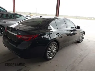 2023 Infiniti Q50 Luxe with VIN JN1EV7BPXPM512588, listed as a IAAI auction lot 41819661 with 30,817 mi miles and . Bid and sale history available at DreamBid. Image 4.
