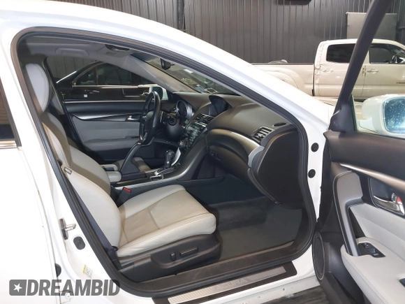 2013 Acura TL Advance z VIN 19UUA9F74DA003069, wystawiony jako IAAI lot #42281080 z przebiegiem 62 521 mil mil oraz . Historia ofert i sprzedaży dostępna na DreamBid. Obrazek 5.