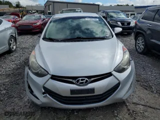 2013 Hyundai Elantra Coupe GS PZEV with VIN KMHDH6AE2DU023460, listed as a Copart auction lot 71382144 with 124,578 mi miles and Salvage Title. Bid and sale history available at carsss.com. Image 5.