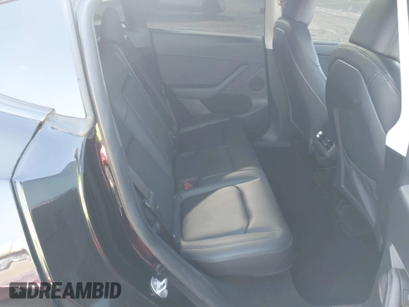 2023 Tesla Model Y Performance with VIN 7SAYGDEF4PF809308, listed as a IAAI auction lot 42056769 with 12,101 mi miles and . Bid and sale history available at DreamBid. Image 7.