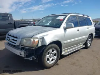 2007 Toyota Highlander with VIN JTEGD21A270169156, listed as a IAAI auction lot 41596624 with 128,452 mi miles. Bid and sale history available at carsss.com. Image 2.