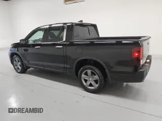 2023 Honda Ridgeline RTL-E with VIN 5FPYK3F79PB038896, listed as a Copart auction lot 58401225 with 23,531 mi miles and Clean title. Bid and sale history available at DreamBid. Image 2.