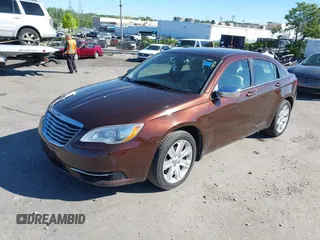 2013 Chrysler 200 Touring with VIN 1C3CCBBB0DN629947, listed as a IAAI auction lot 42216657 with 166,240 mi miles. Bid and sale history available at carsss.com. Image 2.