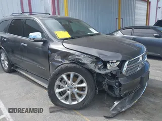2020 Dodge Durango Citadel Anodized Platinum z VIN 1C4RDHEG0LC214358, wystawiony jako IAAI lot #41996234 z przebiegiem 71 154 mil mil oraz . Historia ofert i sprzedaży dostępna na DreamBid. Obrazek 1.