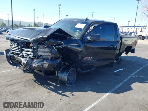 2018 Chevrolet Silverado 1500 LTZ with VIN 3GCUKSEC1JG560567, listed as a IAAI auction lot 41664625 with Not Provided miles and . Bid and sale history available at DreamBid. Image 16.