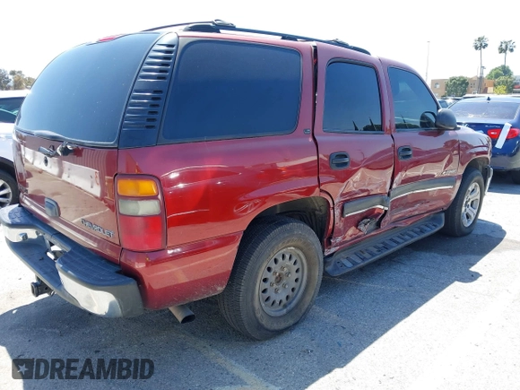 2002 Chevrolet Tahoe LT with VIN 1GNEC13Z92R126893, listed as a IAAI auction lot 42149116 with 223,672 mi miles and . Bid and sale history available at DreamBid. Image 4.