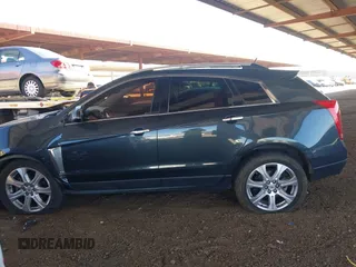 2014 Cadillac SRX Premium Collection z VIN 3GYFNDE31ES653114, wystawiony jako IAAI lot #42107858 z przebiegiem 125 192 mil mil oraz . Historia ofert i sprzedaży dostępna na DreamBid. Obrazek 14.