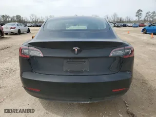 2023 Tesla Model 3 with VIN 5YJ3E1EA5PF421598, listed as a Copart auction lot 47036995 with 6,511 mi miles and Salvage Title. Bid and sale history available at carsss.com. Image 6.