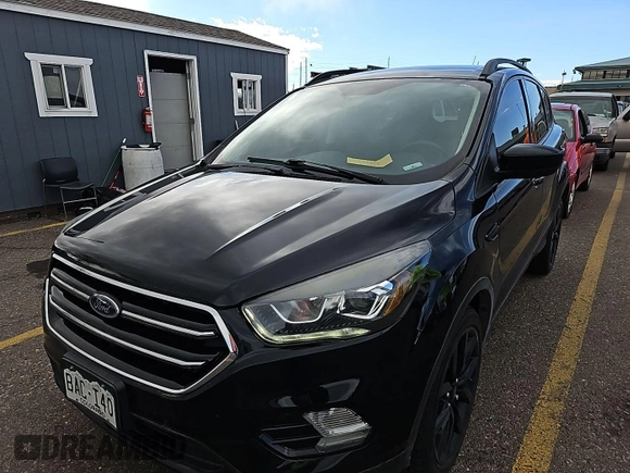 2018 Ford Escape SE z VIN 1FMCU9GDXJUA69802, wystawiony jako IAAI lot #42413413 z przebiegiem 92 564 mil mil oraz . Historia ofert i sprzedaży dostępna na DreamBid. Obrazek 8.