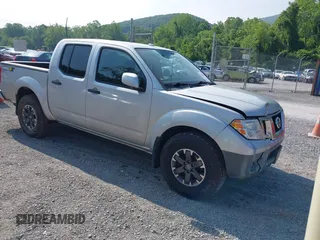 2018 Nissan Frontier SV with VIN 1N6AD0EVXJN743148, listed as a IAAI auction lot 42398810 with 82,286 mi miles and . Bid and sale history available at DreamBid. Image 1.