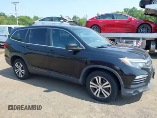 2016 Honda Pilot EX-L z VIN 5FNYF6H51GB123130, wystawiony jako IAAI lot #42409779 z przebiegiem 191 318 mil mil oraz . Historia ofert i sprzedaży dostępna na DreamBid. Obrazek 6.
